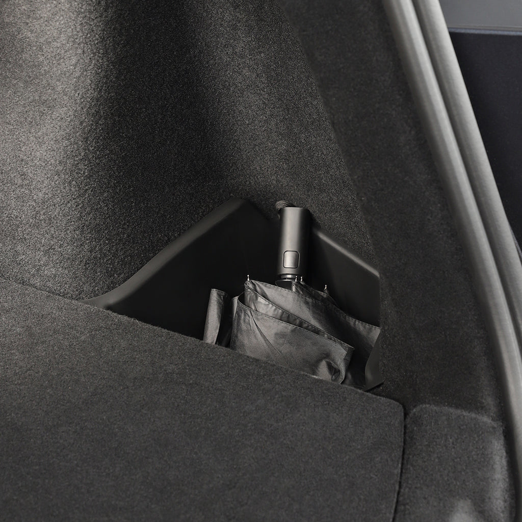 Put umbrella in Model Y Juniper Cargo Storage Bins